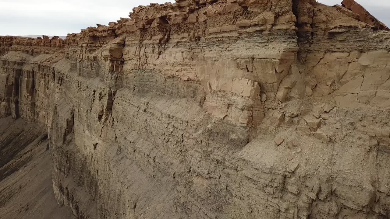 Close Up Aerial View of Massive Butte Rock Formation in Utah Desert, USA