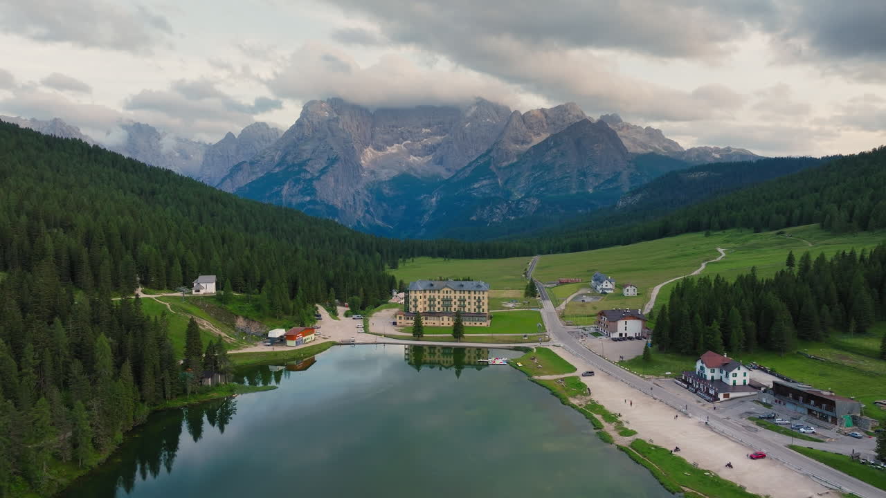 Panoramic drone shot of Lake Misurina ( Lago di Misurina ) in Dolomites, Italy during springtime