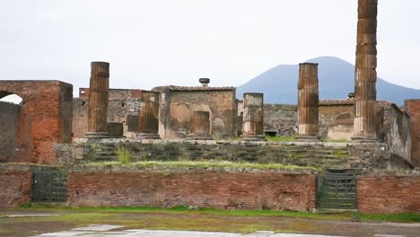 ruins of famous pompeii city, italy.temple of aesculapius or jupiter meilichios