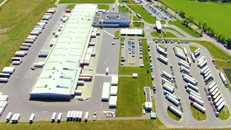 aerial view of warehouse storages or industrial factory or logistics center from above