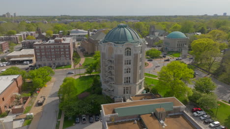 aerial view of city hall in university city with a boom down and tilt up