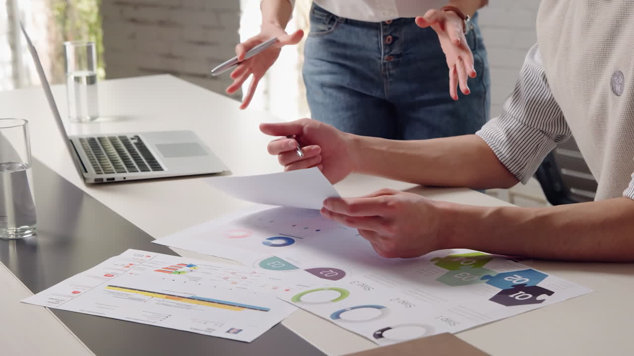 Teammate Briefing discussion, financial portfolio business people meeting for teamwork investment profit, paperwork. Online, research budget analyst with economist for audit feedback, planning project