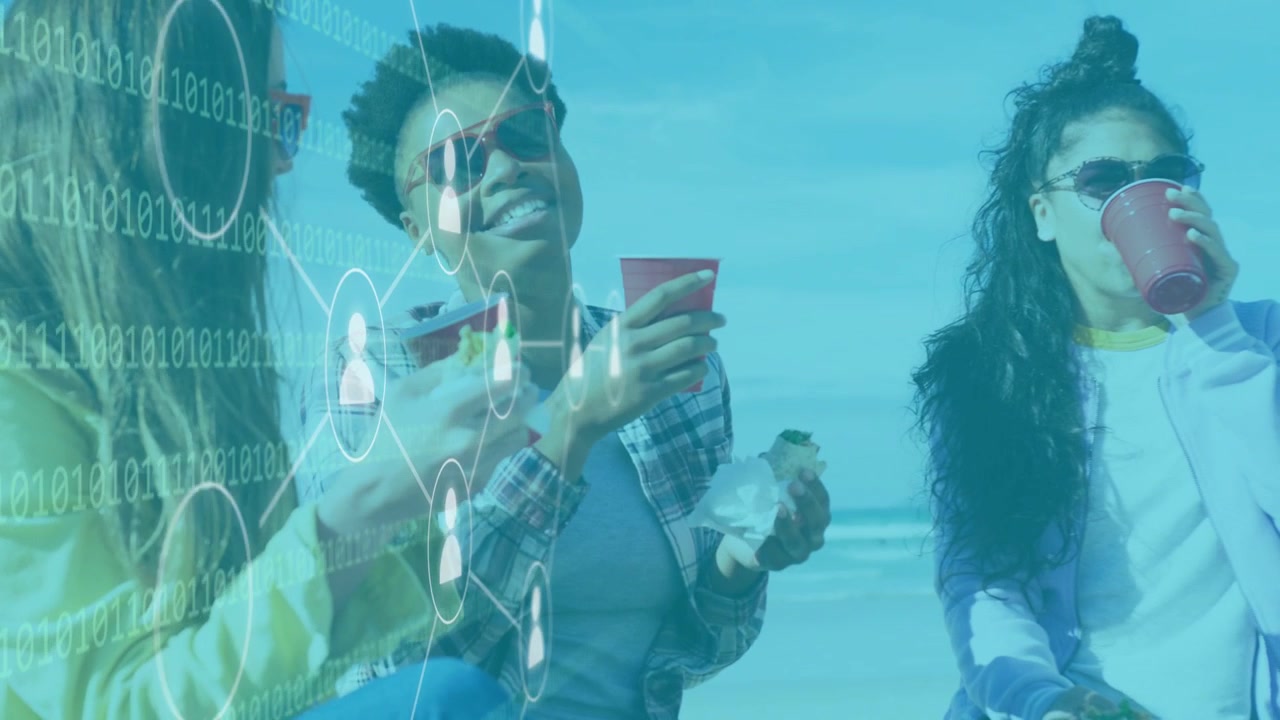 Vertical video: Reacting to data overlay from left 3 women lifting cups snacking at beach in shades
