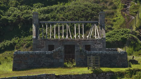 ruined stone building on a hillside