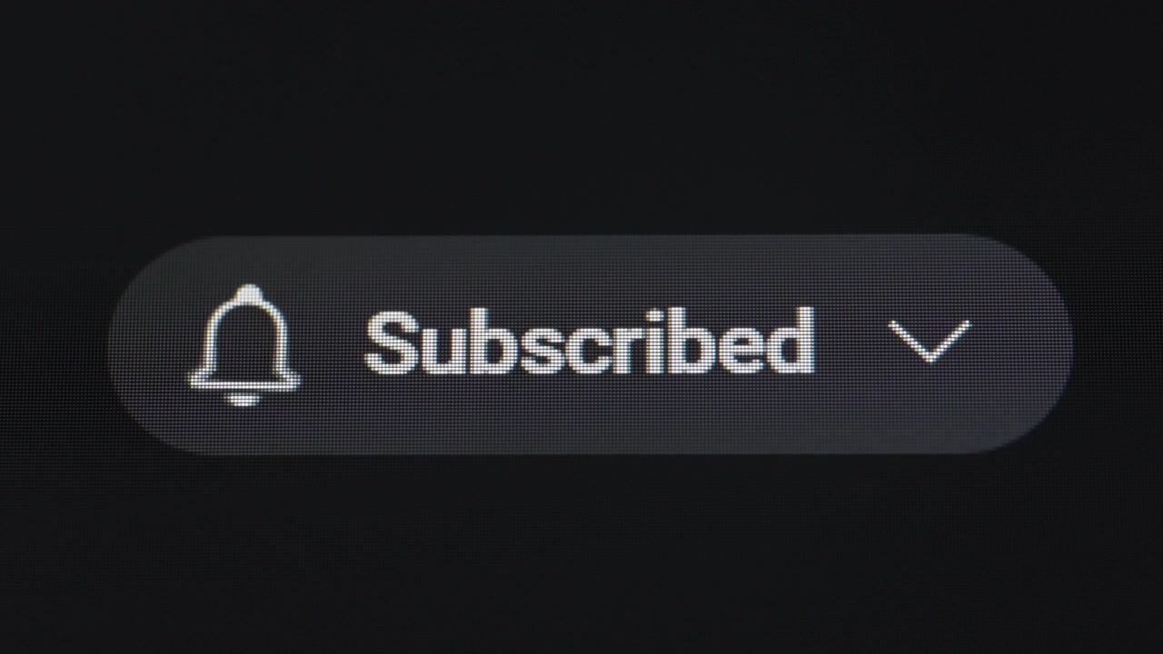 Clicking subscribe button with fireworks