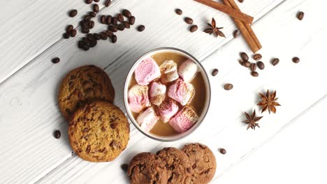 mug of cacao with marshmallows and cookies