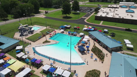 aerial view of aquatic centre swimming pool near the siloam springs intermediate school in arkansas, usa