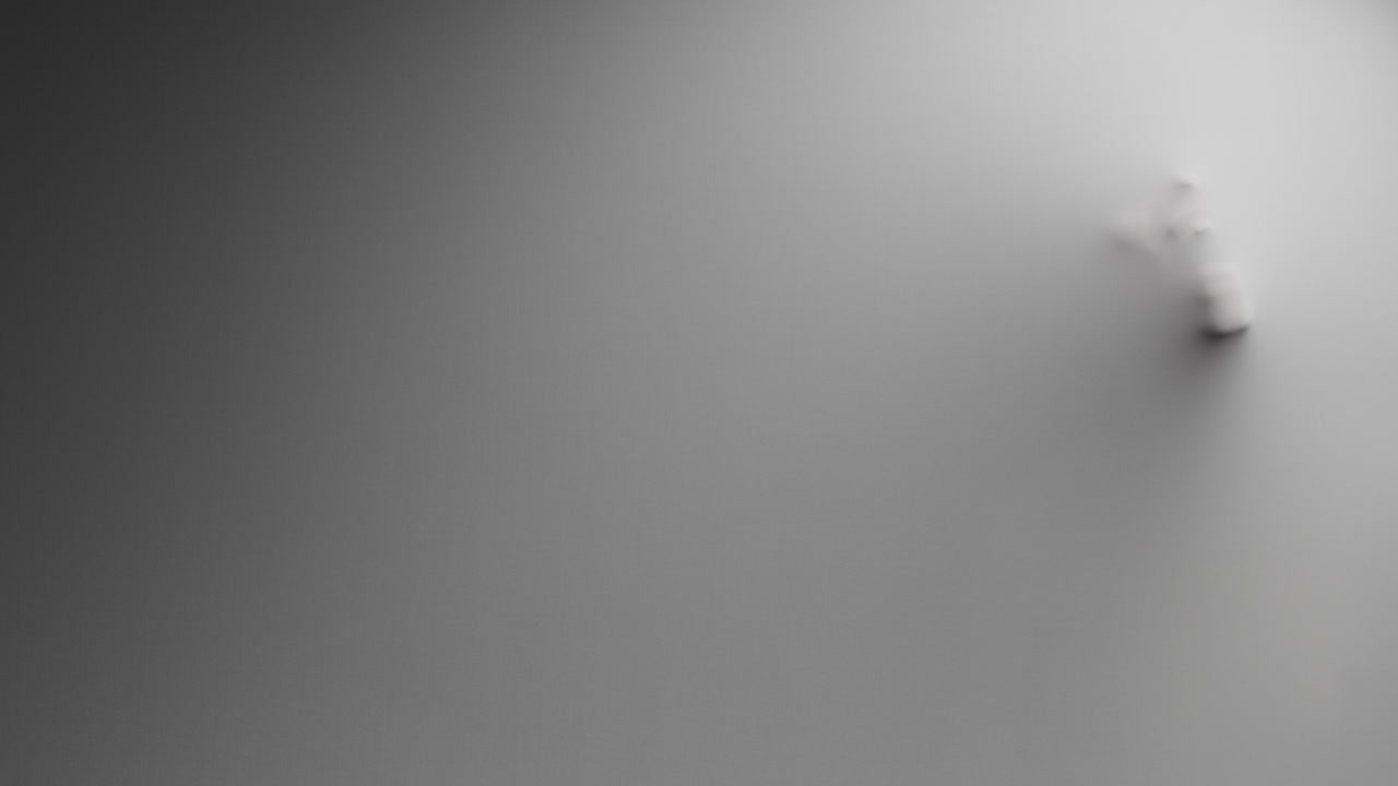 A creepy silhouette of a woman appears from the white surface