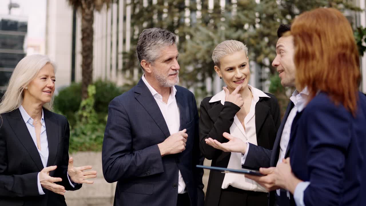 Business team meeting outdoors