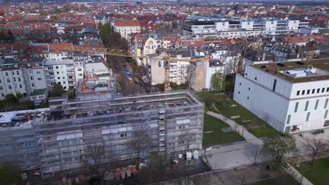 construction crane nice aerial top view flight berlin city construction work on house with crane