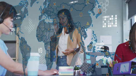 animation of world map against african american businesswoman talking on smartphone at office
