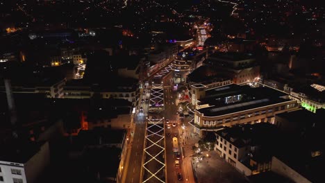 City-Christmas-lights-illuminating-streets-of-Funchal-in-December,-aerial,-Rua-Brigadeiro-Oudinot