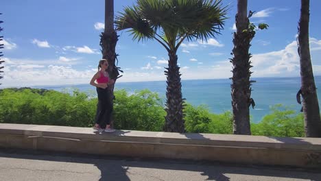 woman running on coastal path