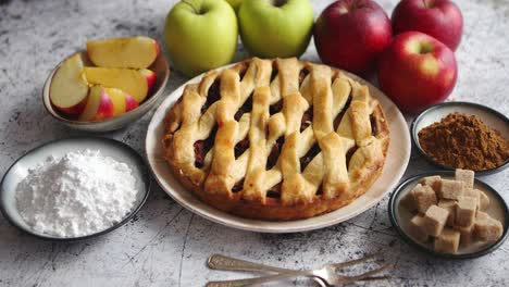 fresh baked tasty homemade apple pie cake with ingredients on side