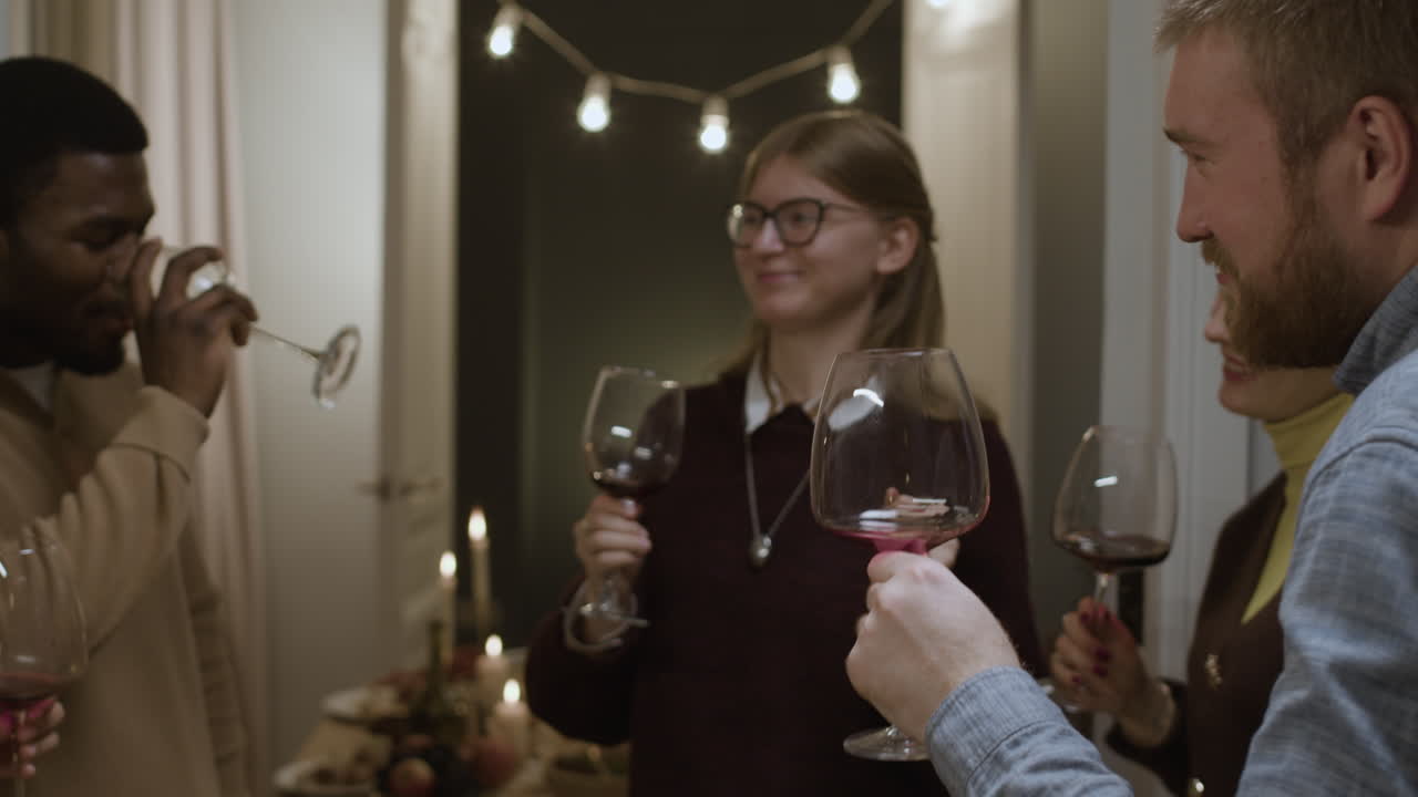 People celebrating together with wine glasses