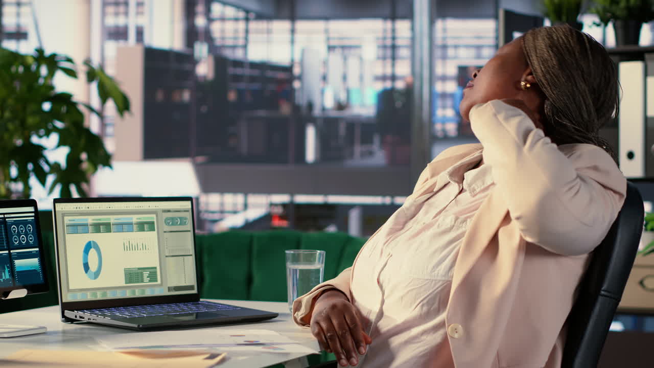 Stressed businesswoman working in office