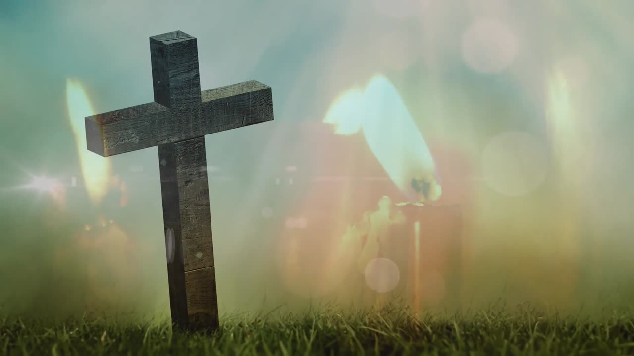 animación de luces brillantes sobre el crucifijo y el paisaje