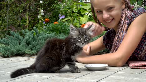 girl and kitten