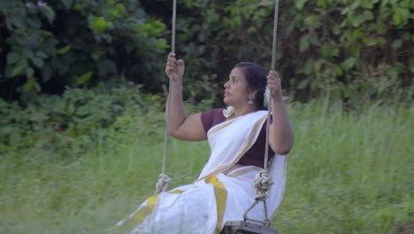 onam traditional swing in kerala called oonjal attam is traditional family entertainment during onam celebration