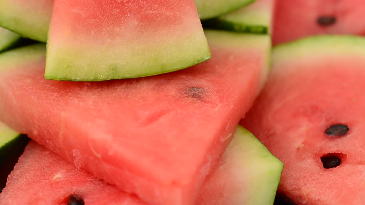 Shooting of pieces of a watermelon. Shooting in the movement