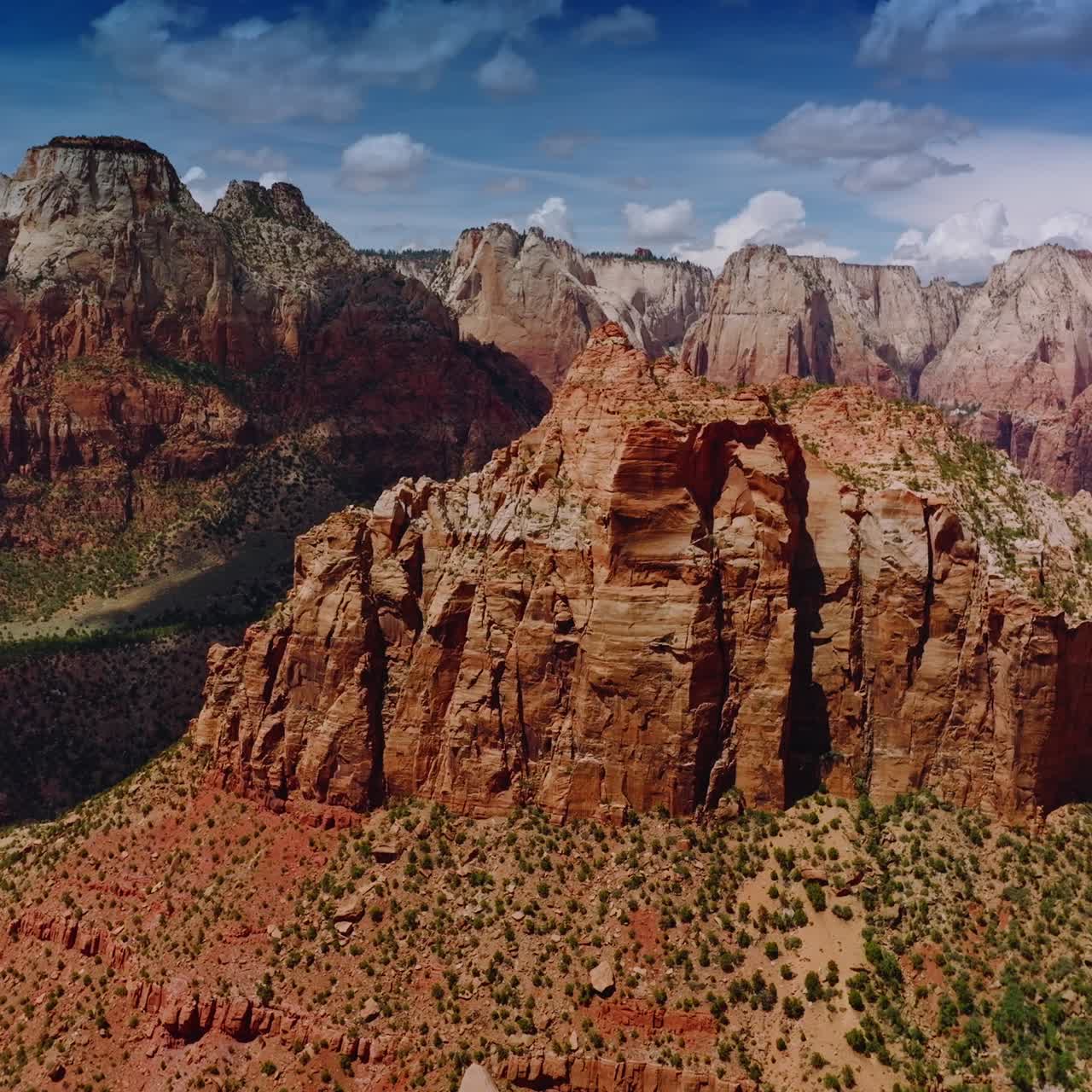 Impressive view of stunning rocks in Zion National Park in Utah, USA. Amazing canyons At the backdrop of bright cloudy sky