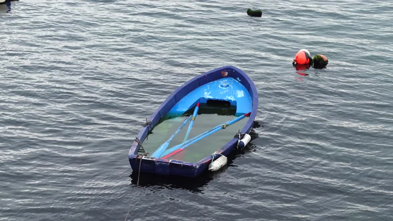 The drowned boat in the ocean. Atlantic Ocean