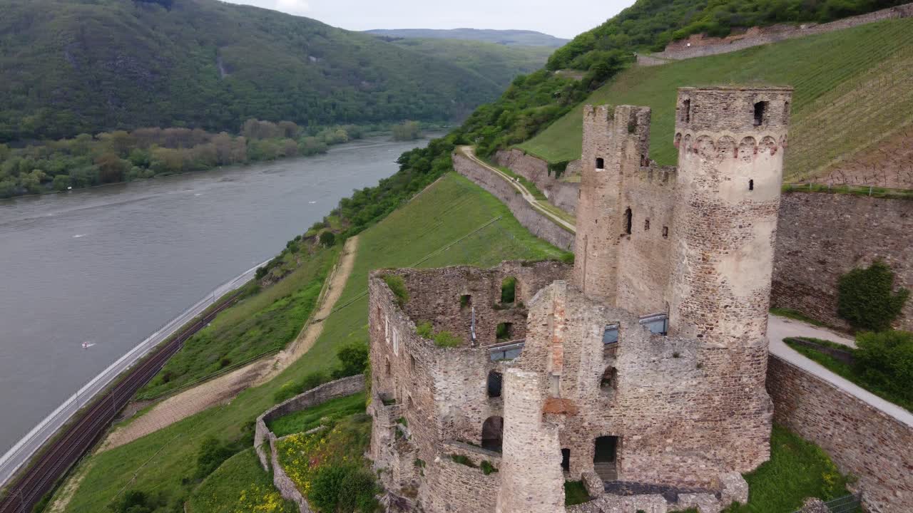 Castle ruins of Burg Ehrenfels and hillside vineyards of middle Rhine Valley in Ruedesheim
