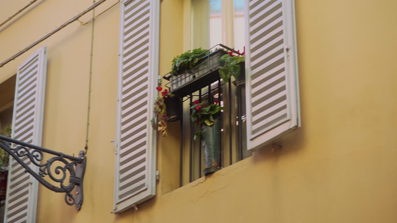 Italian Building Facade with Windows and Shutters