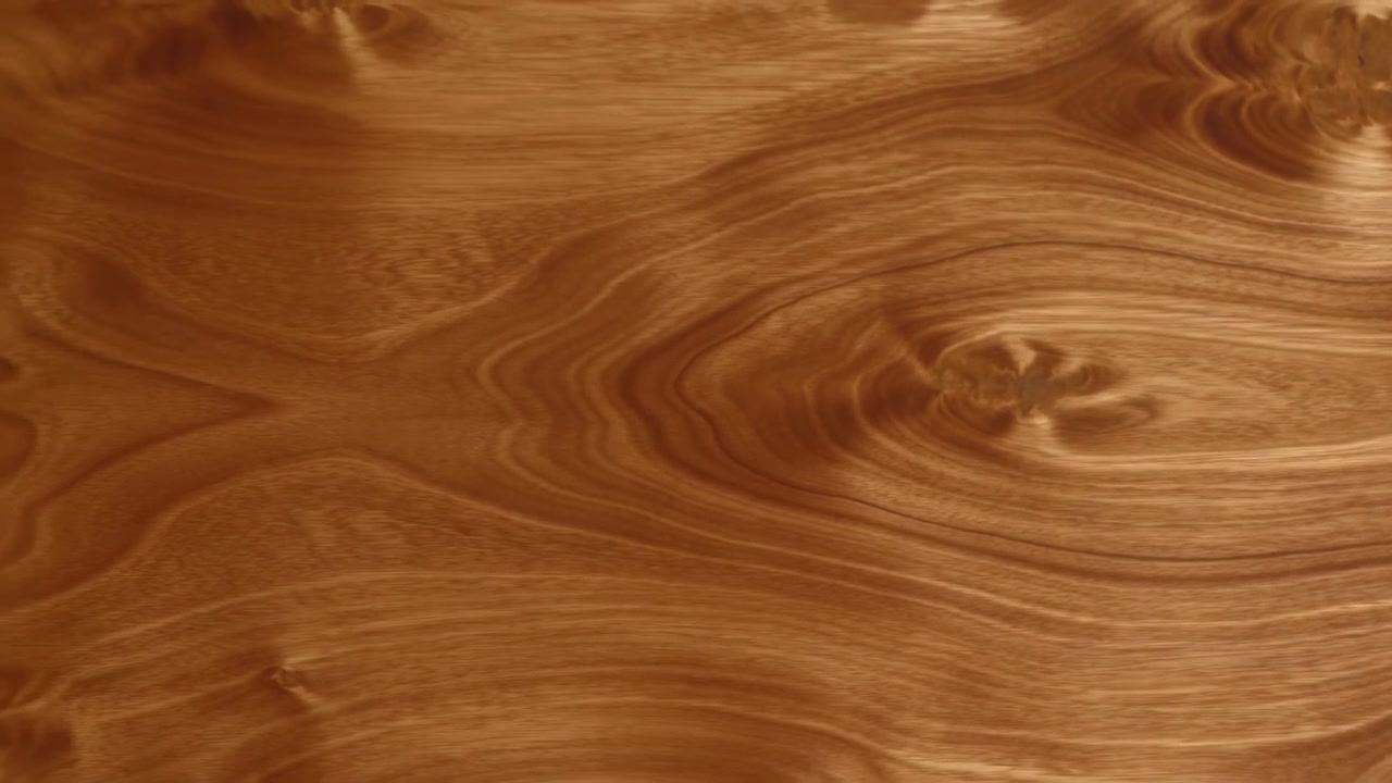 Holzmaserung, keine Aktion, in einer studioähnlichen Innenumgebung, mit Holzmaserung, mit Holztextur, aus der Vogelperspektive, mit braunen, orangefarbenen Akzenten und neutraler Stimmung.
