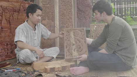 Asian Males Showing Carved Wood And Thumb Up, Slow Motion
