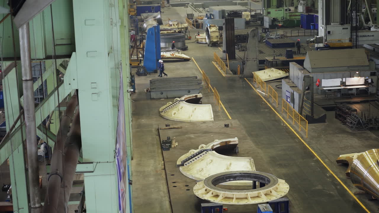 Large Industrial Manufacturing Facility with Workers