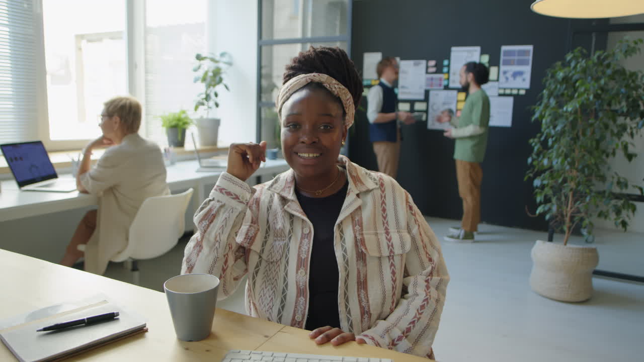 African American Woman Web Calling from Office