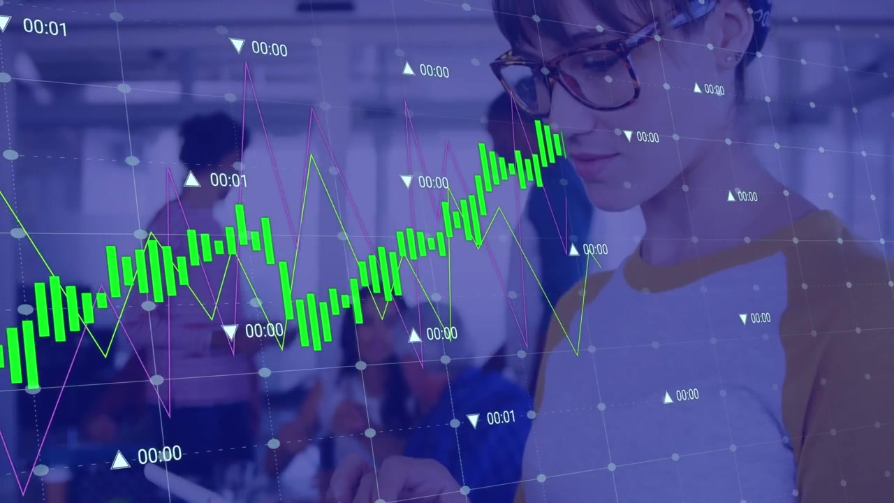 オフィスでタブレットを使って金融データを分析する若い女性