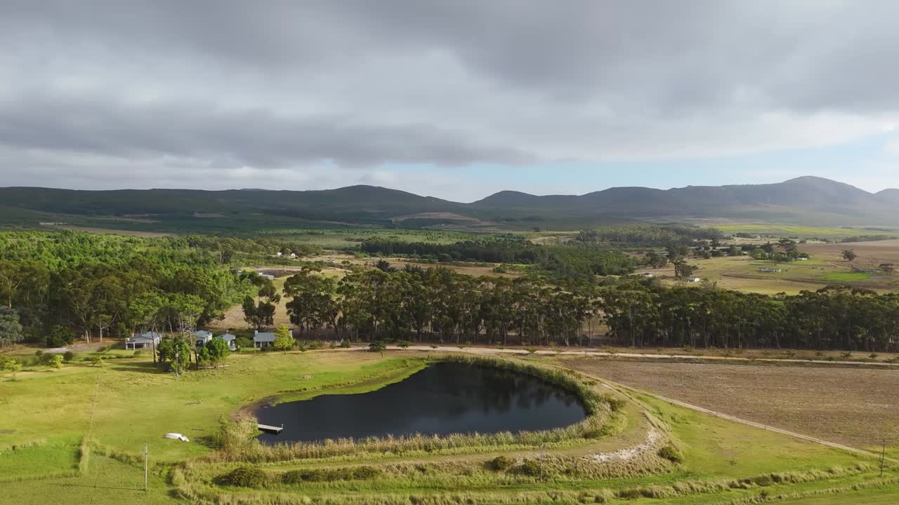 Drone shot showing vast land surrounding the honey bee farm