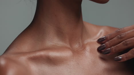 hands touch, skincare and body of woman in studio