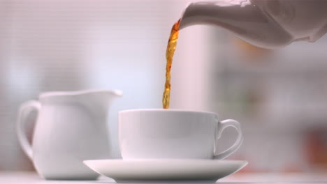 teapot pouring tea