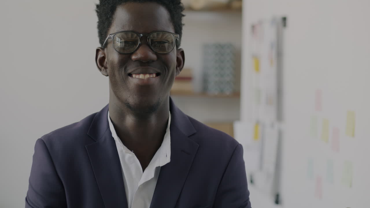 Smiling African American Business Man in Office