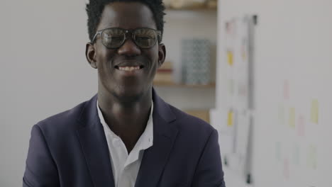 smiling african american business man in office