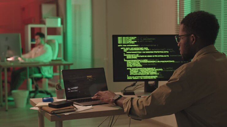 Black Man Hacking Computer