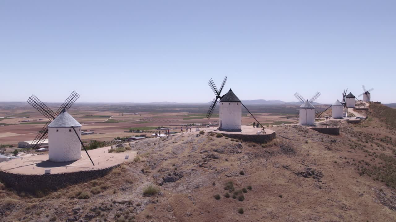 Spain. Spanish windmills of La Mancha. Panoramic aerial travelling shot. Don Quixote. Consuegra