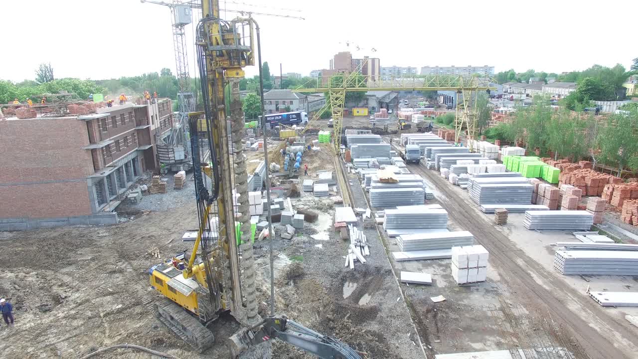 Boer Bore The Ground. Aerial shot of the drilling rig boring hole in soil at construction site