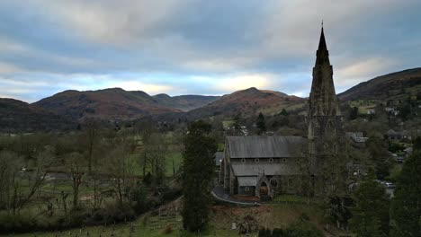 Aerial-footage-of-Ambleside-the-Lakeland-town-and-former-civil-parish,-now-in-the-parish-of-Lakes,-in-Cumbria,-in-North-West-England-2023