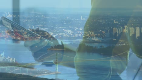 animation of cityscape over african american woman using smartphone