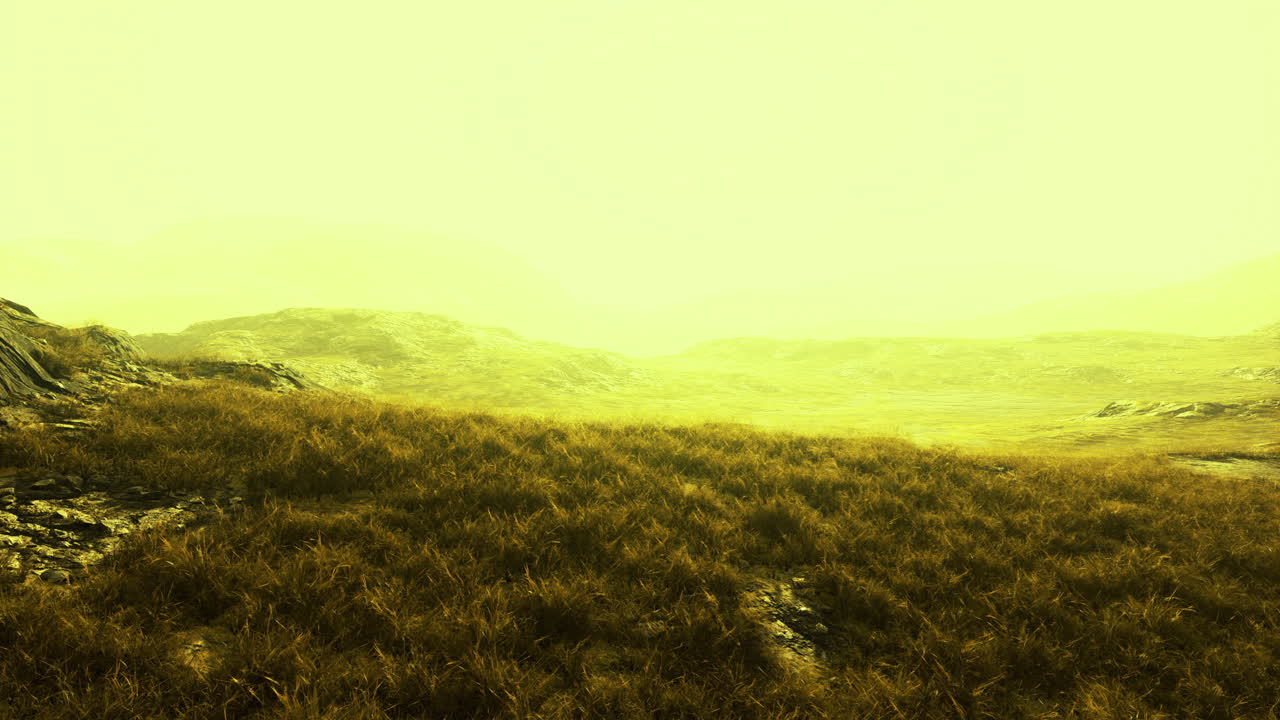 Serene golden landscape with gentle hills under soft sunlight at dusk