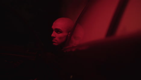 man in a car at night