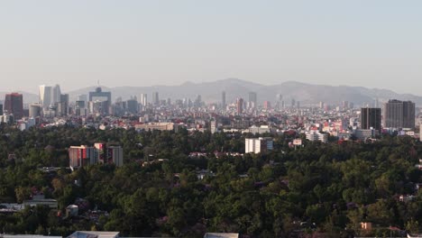 sunset in cdmx buildings with a parallax effect captured by a drone
