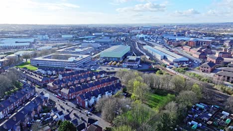 On-a-bright-and-sunny-day,-an-aerial-shot-of-a-running-train-is-made-from-above