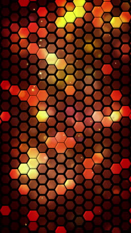 red abstract hexagonal background with hot glow element. looped animation with glitter. vertical video.