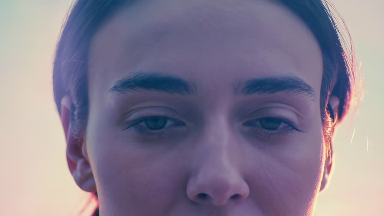 Close-up of a woman's face with eyes closed