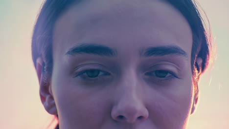 close-up of a woman's face with eyes closed